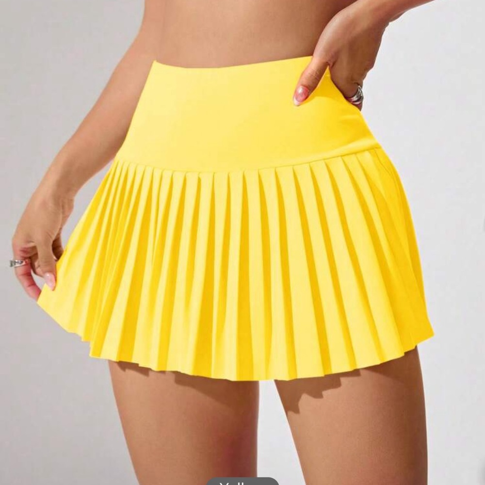 Gym skirt with shorts built in. I am sending both skirts